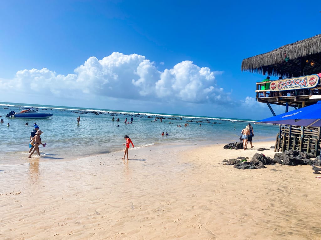 a child walking on the beach