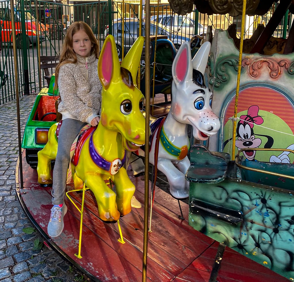 child on a carousel
