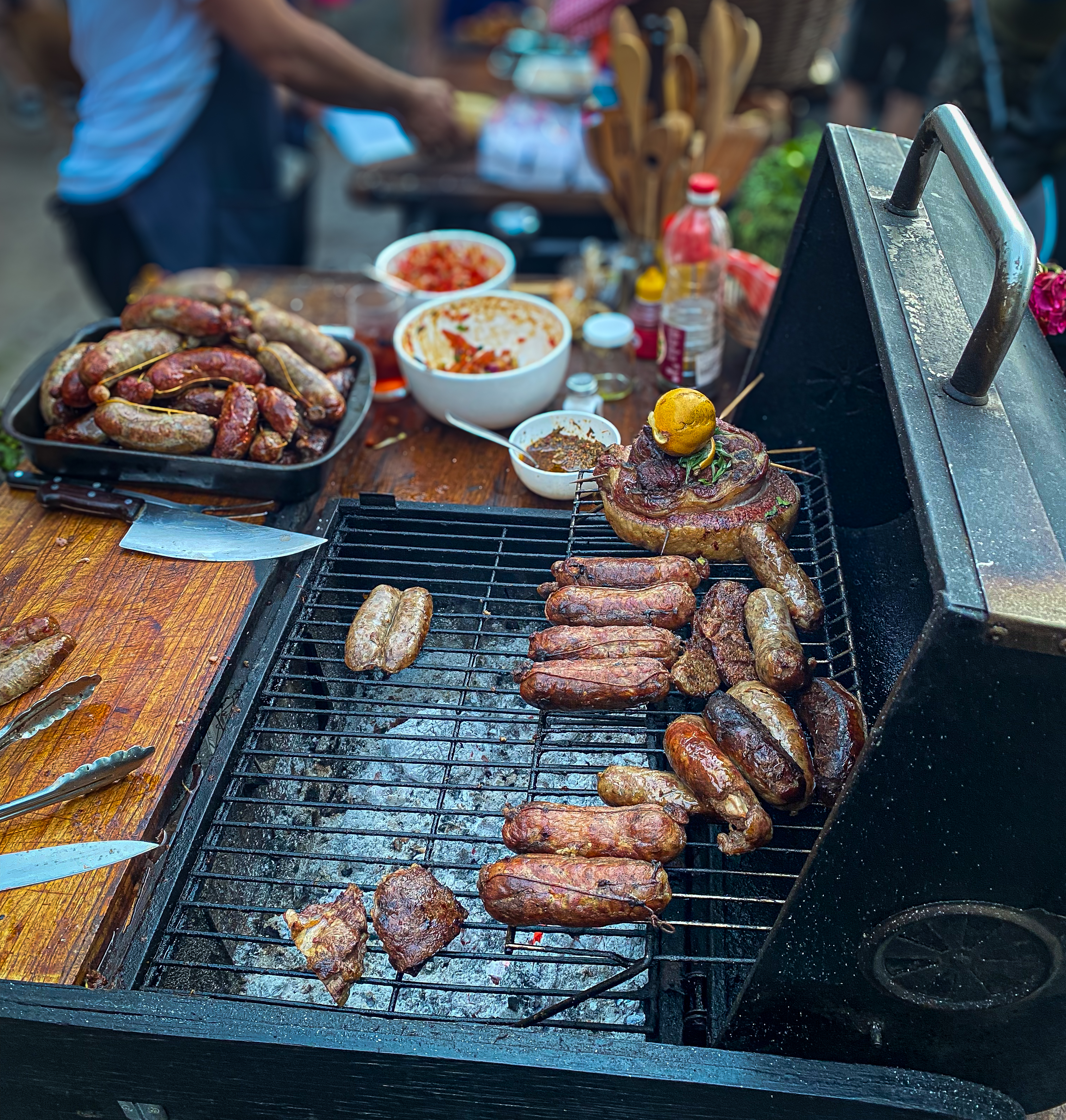 a grill with a variety of meats.
