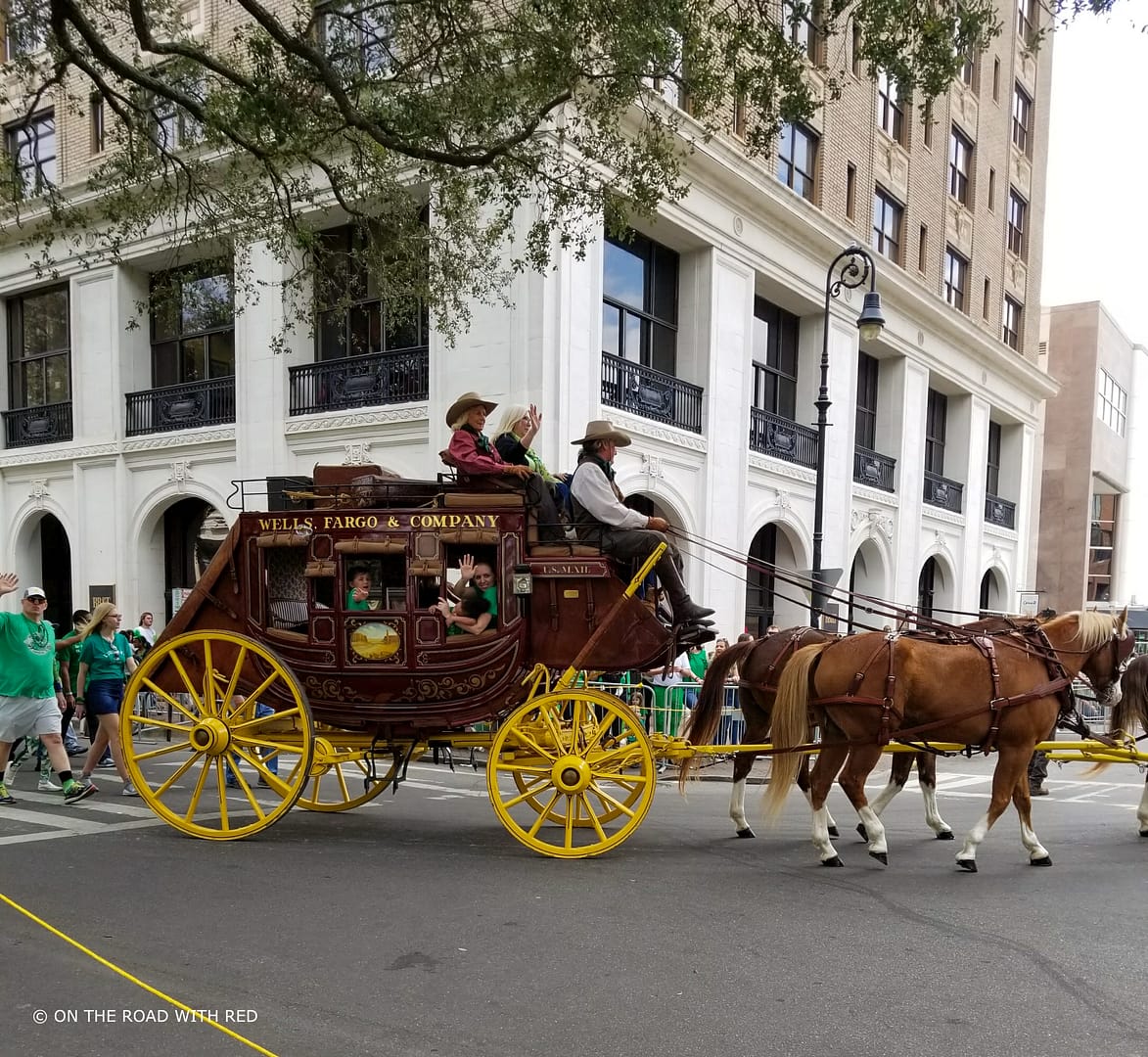 clydesdale horses pulling a float in a parade