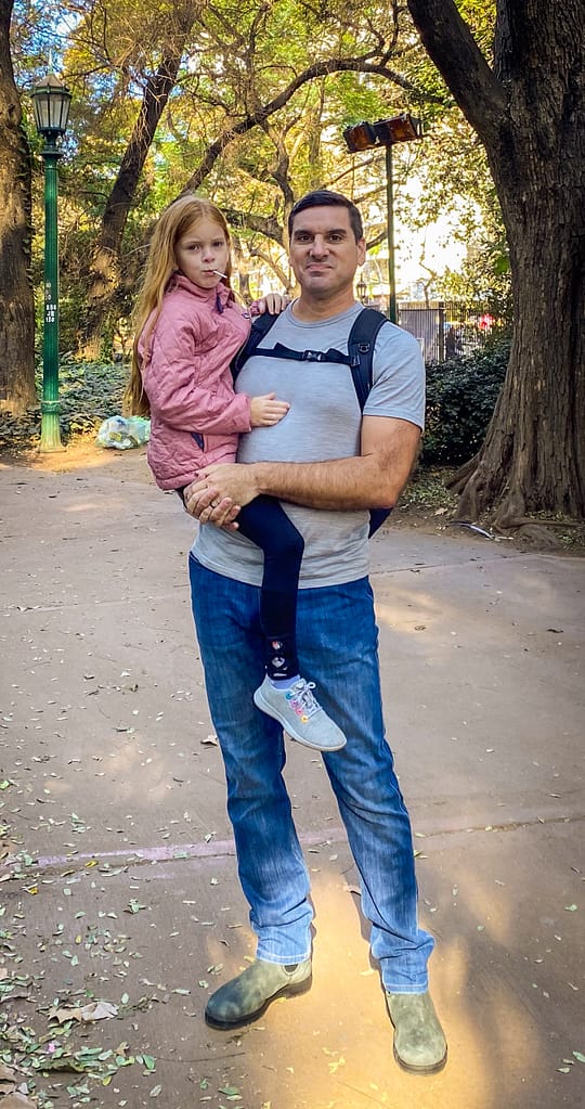 a man holding a child