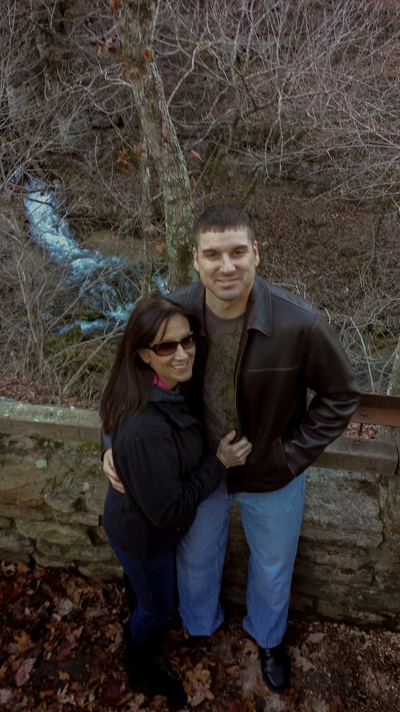 a man a woman in the woods